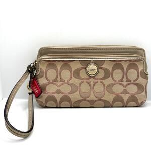 COACH Gold, Tan, and Pink Signature Canvas Wristlet